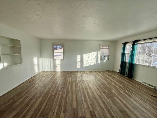 Building Photo - Charming Vintage Home on a Large Corner Lot with 3-Car Detached Garage/Shop!