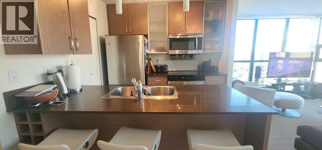 Photo du bâtiment - 909 Mainland St