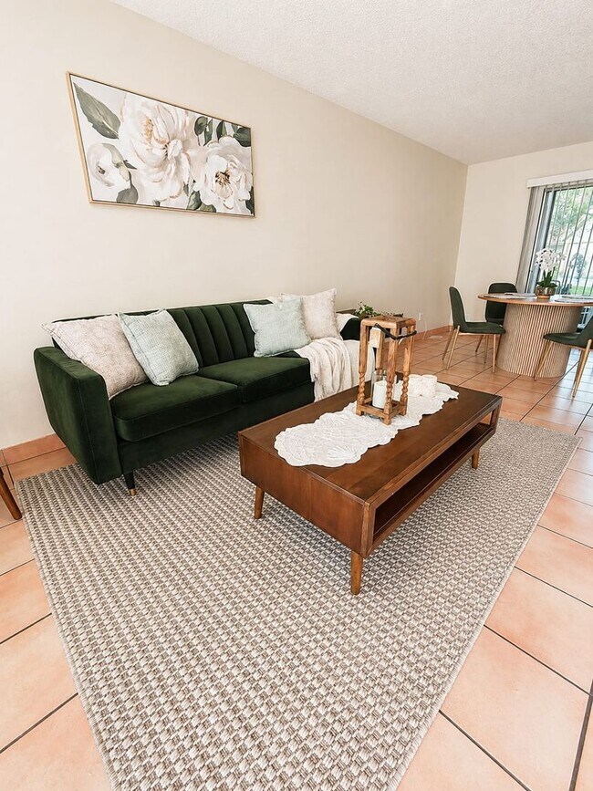 Building Photo - Charming 1 Bedroom / 1 Bathroom Condo – First Floor Unit with Florida Room in a Gated Community.