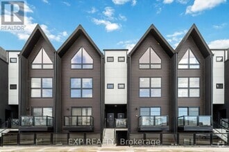 Building Photo - 7277-7277 Wilson Crescent