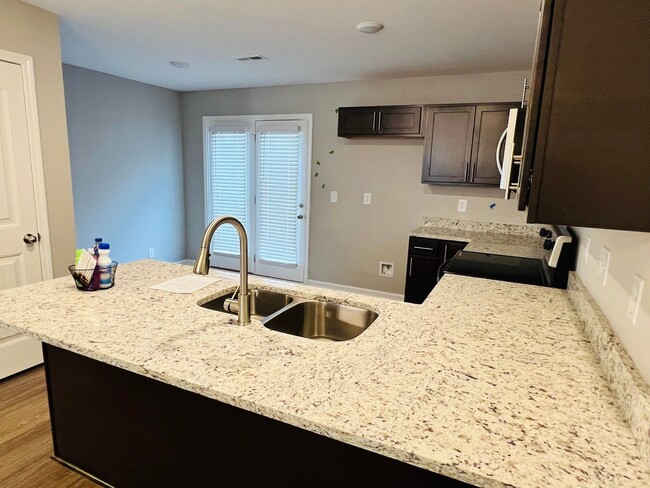 New stainless fridge will be here prior to move-in! - 242 Woodland Valley Ln
