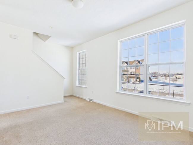 Building Photo - Modern 3 Bedroom Townhome with Garage & Outdoor Amenities!