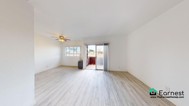 Building Photo - 2 + 2 Spacious 2-Bedroom Condo with Top-Ti...