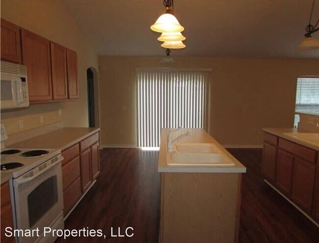 Foto del edificio - 4 br, 2 bath House - 6117 Sunset Vista Dr