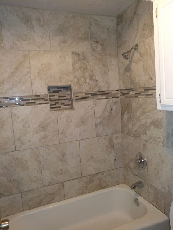 Main bath with tile shower/tub surround with granite counter top - 12324 Green Valley Dr