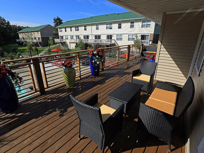 Relax on the deck above the pool! - The Bronco Club