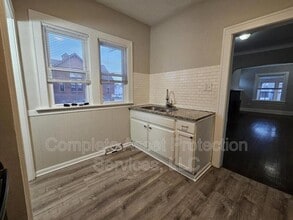 Building Photo - 6404 Harrison Ave