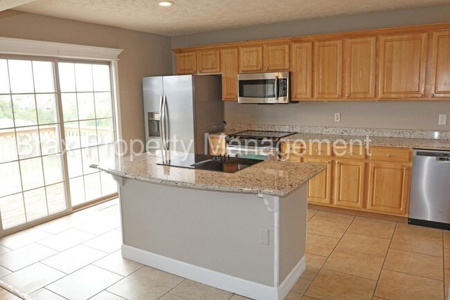 Building Photo - Spacious Open Floor Plan with Basement