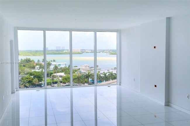 Building Photo - 10275 Collins Ave