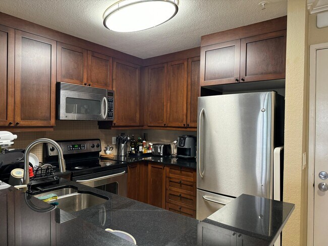 Building Photo - 8889 Caminito Plaza Centro