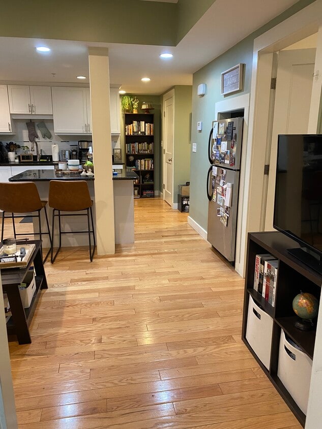 Living room and kitchen area - 2025 Commonwealth Ave