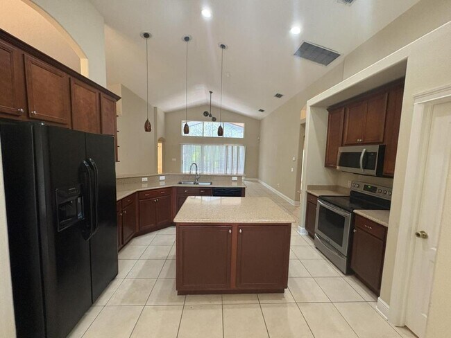 Foto del edificio - 6117 Whimbrelwood Dr