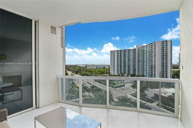 Building Photo - 15811 Collins Ave