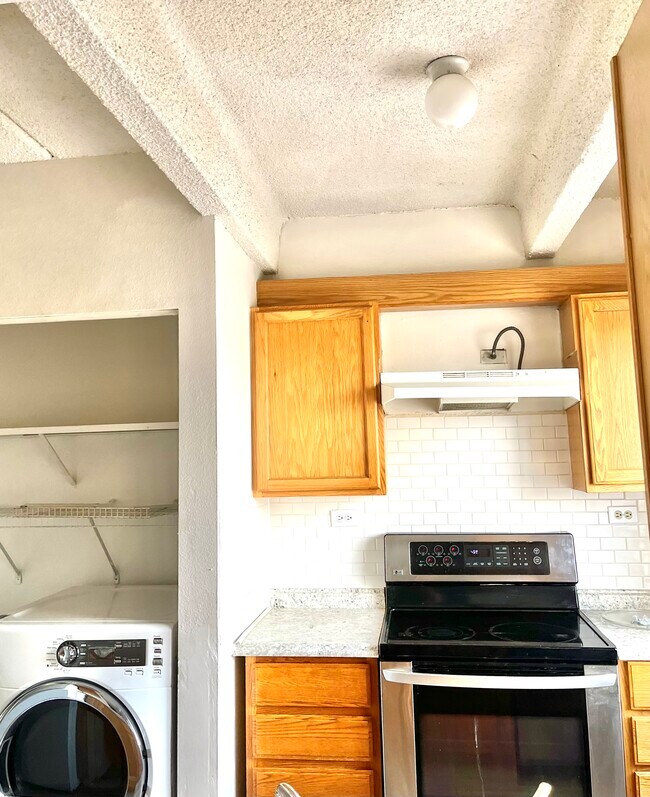 Kitchen/In-unit Laundry - 10650 E Tennessee Ave