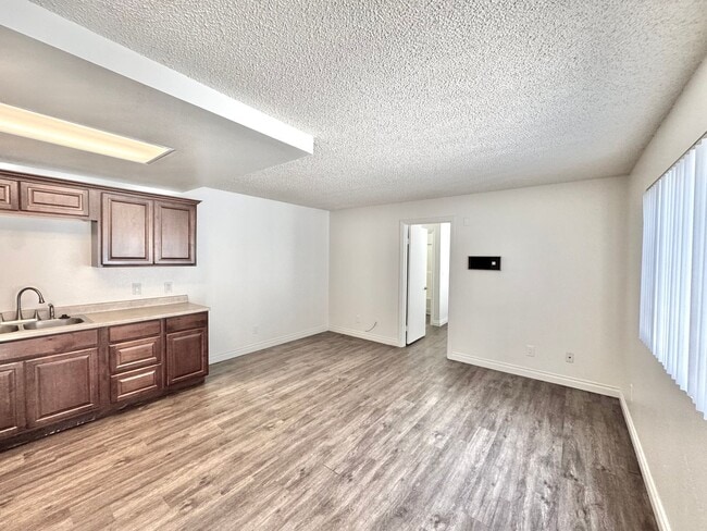 Building Photo - Senior/Disabled Community: 1bd/1ba Nicely updated! On-site laundry, LVP flooring, NO STAIRS! **Se...