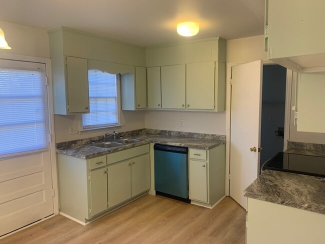 Half bath off of kitchen with washer dryer hook ups - 4569 Ayers Rd