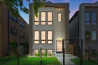 Building Photo - 6408 S Vernon Ave
