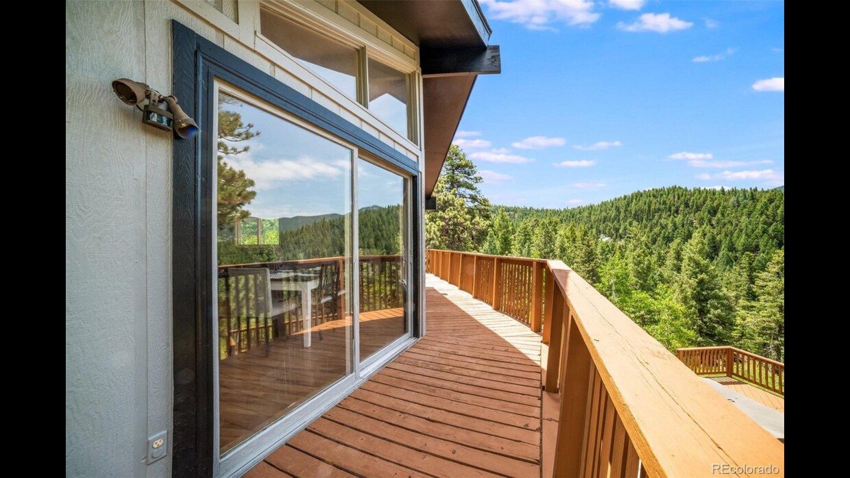 Wrap around deck from kitchen - 29924 Spruce Canyon Dr