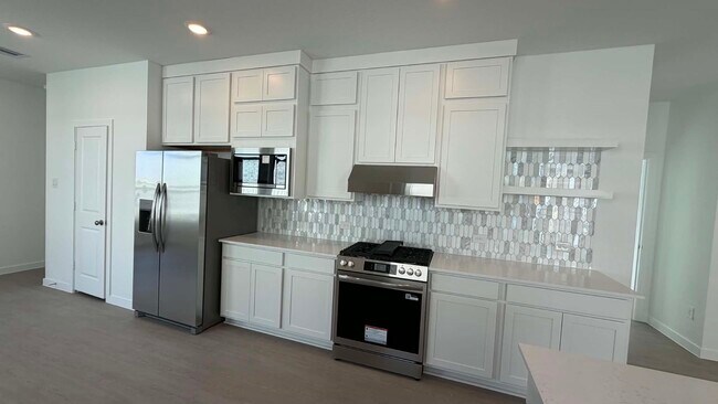 Foto del edificio - 27451 Sunterra Village Dr