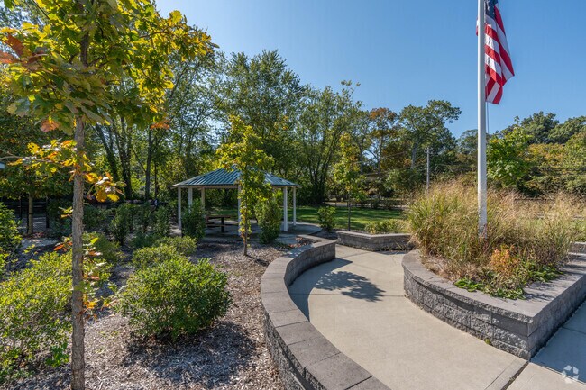 Sit under the canopy and enjoy serene Erb Farm Park.