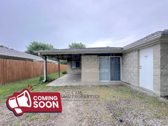 Photo - 9207 E 12th St Townhome