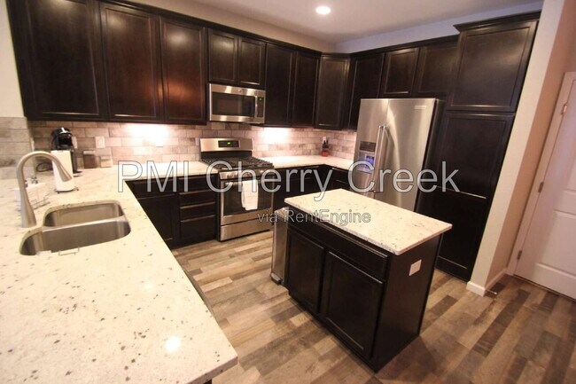Building Photo - 9008 E Caley Way