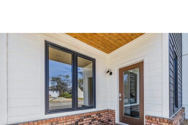 Foto del edificio - Modern 4-Bed Townhouse in Ridgedale – Minu...