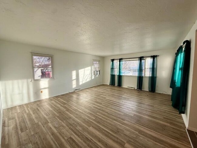 Building Photo - Charming Vintage Home on a Large Corner Lot with 3-Car Detached Garage/Shop!