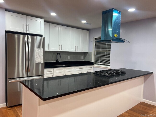 Foto del edificio - 50 Brick Pond Rd