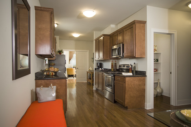 Modern Appliances and Granite in Chef's Kitchen - Townhomes of Caswell