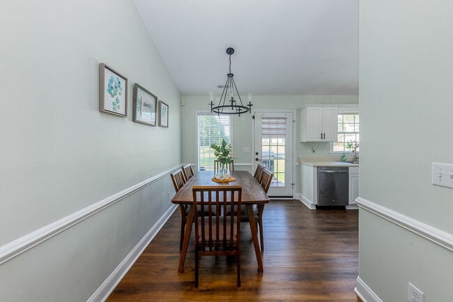 Dining Room: Formal space designed for mealtime gatherings. - 122 Sellhorn Blvd
