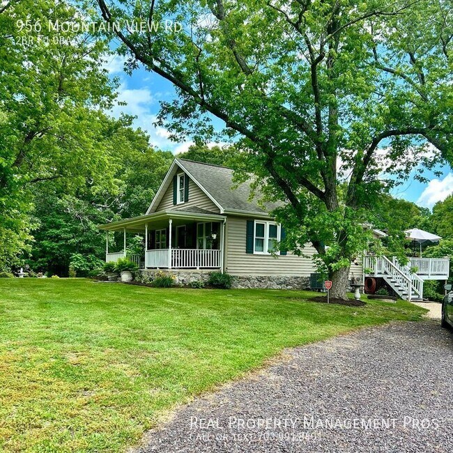 Building Photo - Renovated Bungalow on Private Lot with Mod...