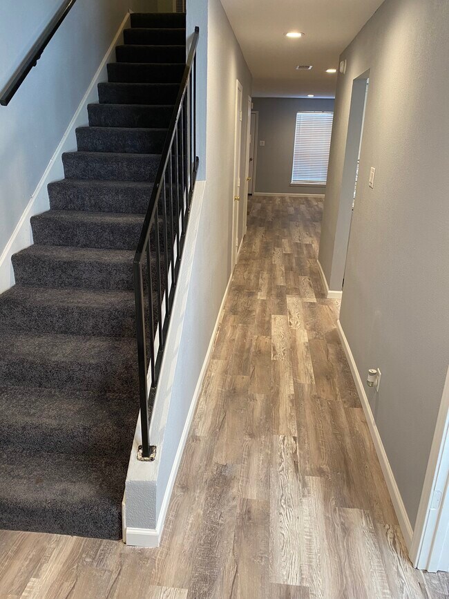Entryway. Brand new carpet & floors. - 15613 Weldon Dr