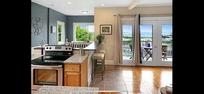Kitchen View to dining nook (back left) - 64 Percival St