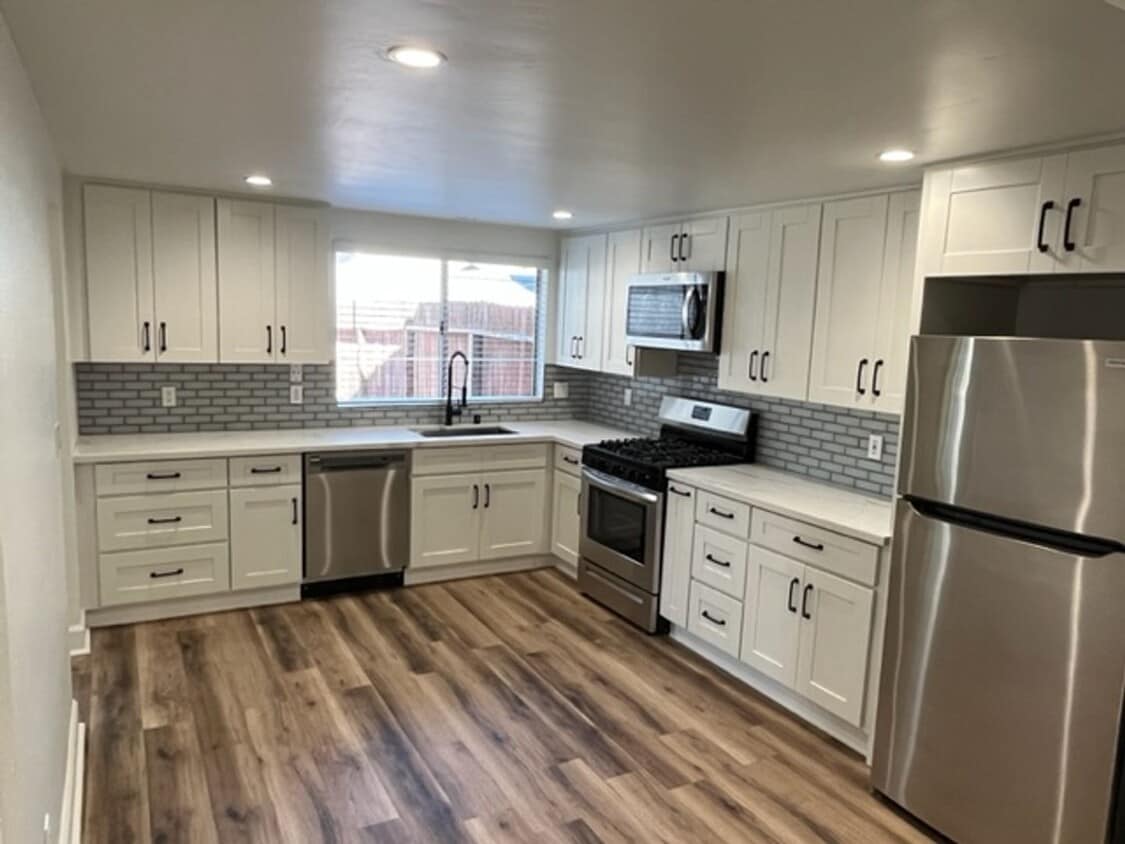 Primary Photo - Newly remodeled attached house - 1/2 Off F...