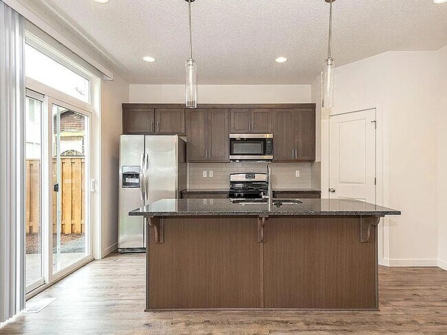 Foto del edificio - 9754 SW Windswept Place ~ Beautiful & Spacious Home