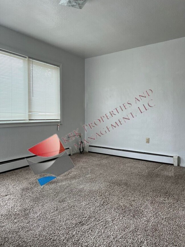 Building Photo - C &amp; J-300 Alamosa