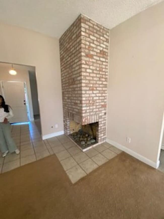 Building Photo - Huge semi-private Backyard with Large Patio!