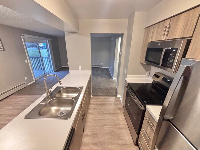 2-bed Renovated Kitchen - The Neighborhood at Englewood