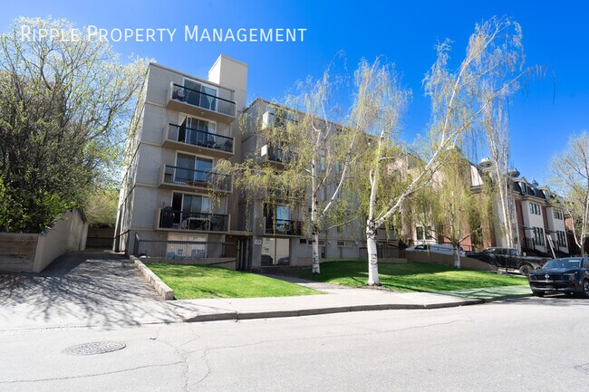 Building Photo - STUNNING TOP-FLOOR RENOVATED 1-BED + DEN CONDO | CITY VIEWS & PRIME LOCATION