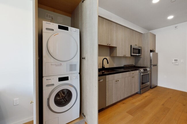 Building Photo - Rare opportunity to rent in a brand new bu...