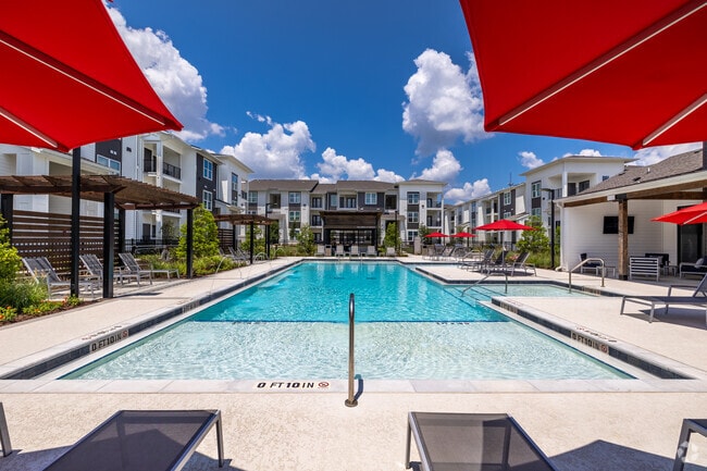 Resort-Style Pool with Baja Tanning Shelf - The Waters At Redstone