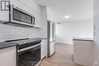 Building Photo - 300-1300 Antibes Dr