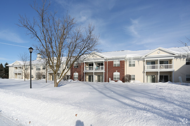 Building behind snow - Legacy at Willow Pond