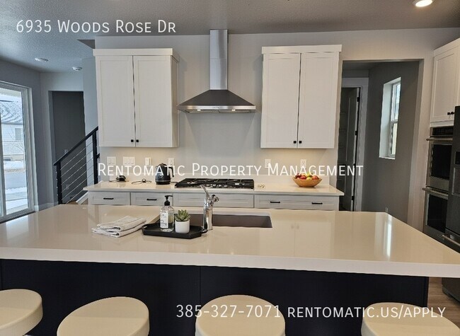Foto del edificio - 6935 Woods Rose Dr