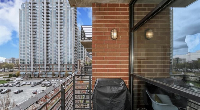 Balcony with private grill overlooking Uptown - 715 N Church St