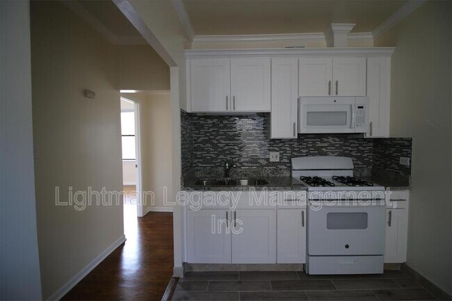 Building Photo - 5028 N Kimball Ave
