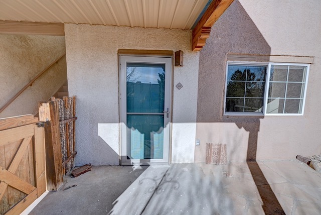 Screen door to enhance air conditioning - 2210 Miguel Chavez Rd