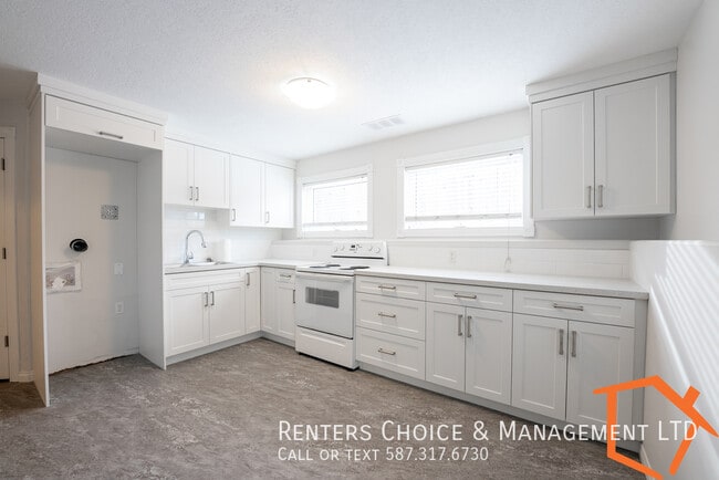 Building Photo - West Lethbridge Lower Level Suite with Private Laundry