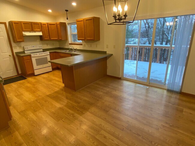Building Photo - Updated 4-Bedroom, 3-Bath Home with Walk-Out Basement